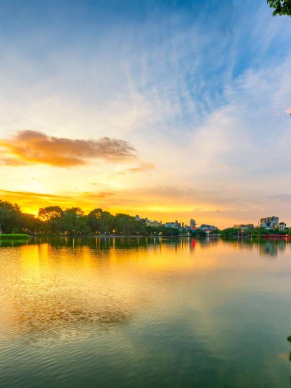 Hanoi Hoan Kiem Lake ( Ho Guom) or Sword lake in the center of Hanoi in cinematic sunset sky