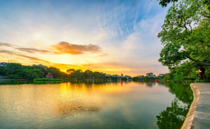 Hanoi Hoan Kiem Lake ( Ho Guom) or Sword lake in the center of Hanoi in cinematic sunset sky