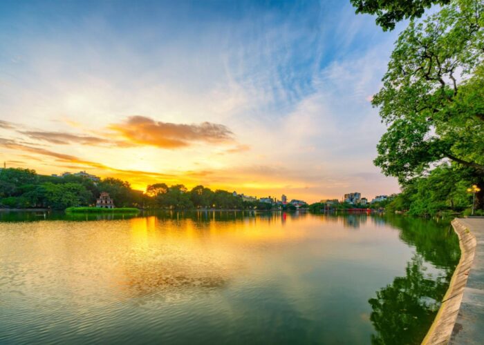 Hanoi Hoan Kiem Lake ( Ho Guom) or Sword lake in the center of Hanoi in cinematic sunset sky